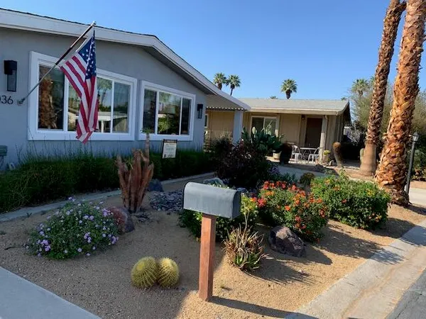 a front view of a house with patio