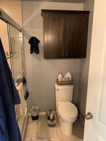 a bathroom with a toilet and a sink