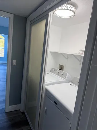 a utility room with dryer and washer