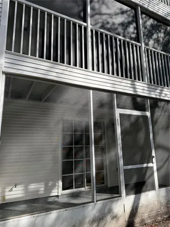 a view of outdoor space with wooden floor