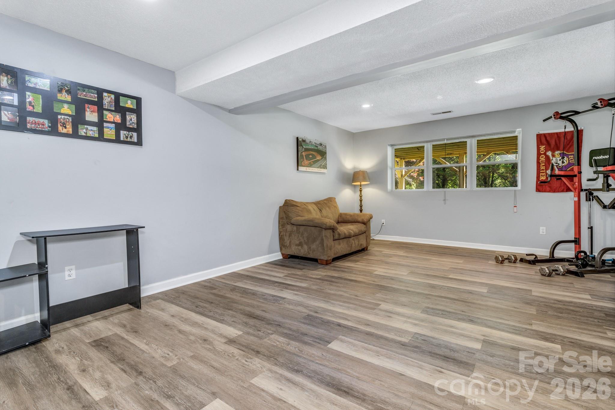 13 Spring Lake Drive Fletcher, NC 28732 - Photo 25 of 30 a spacious bedroom with a bed and a window