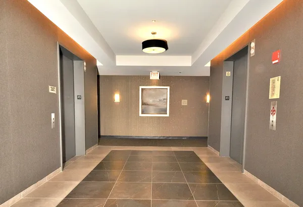 a view of a hallway to a bedroom