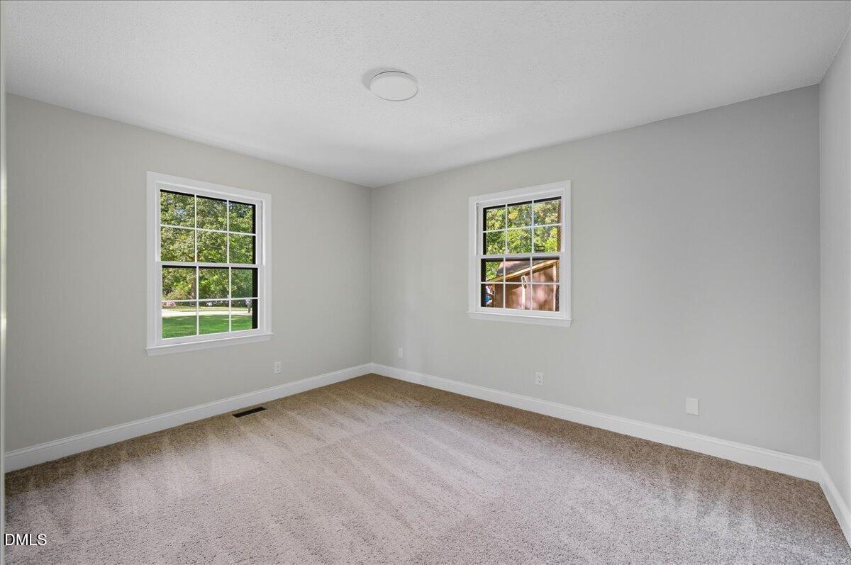 1214 East Oak Drive Durham, NC 27712 - Photo 29 of 36 an empty room with windows
