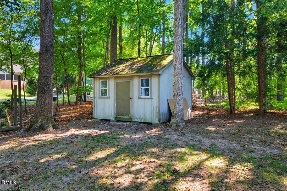 1214 East Oak Drive Durham, NC 27712 - Photo 33 of 36 a view of a house with a yard