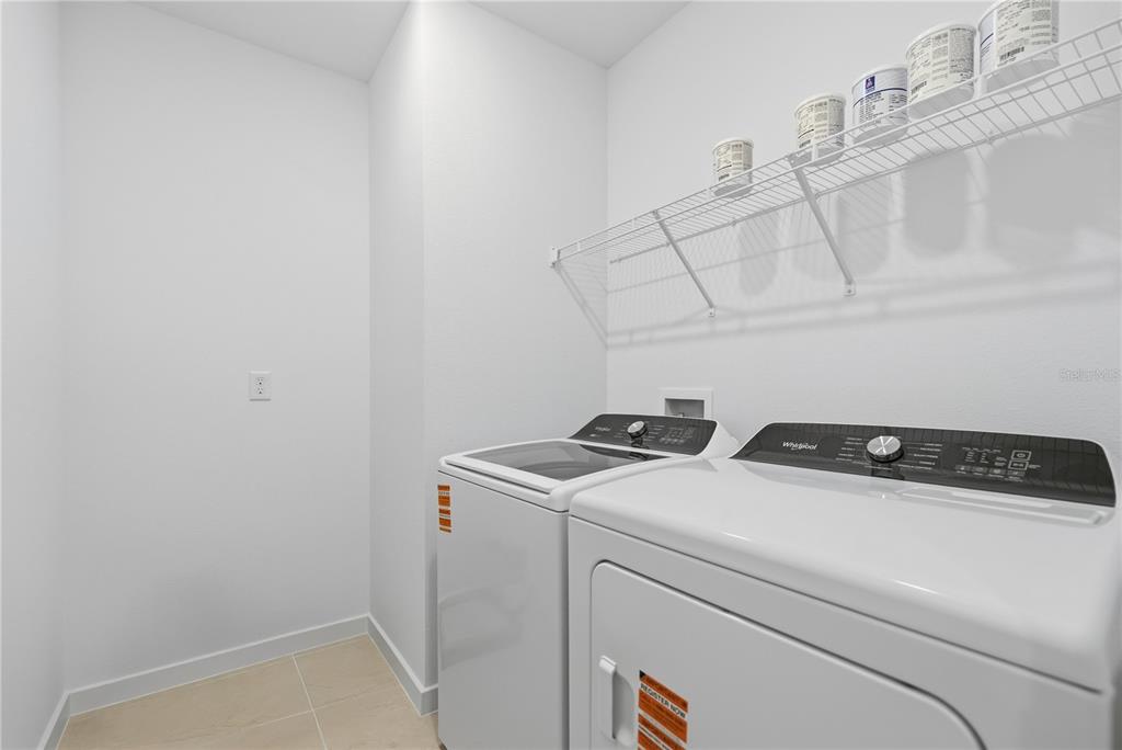 6760 Southwest 90th Loop Ocala, FL 34476 - Photo 18 of 28 a utility room with dryer and washer