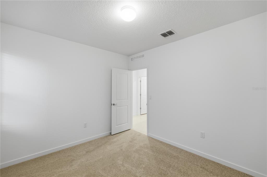 6760 Southwest 90th Loop Ocala, FL 34476 - Photo 20 of 28 a view of an empty room