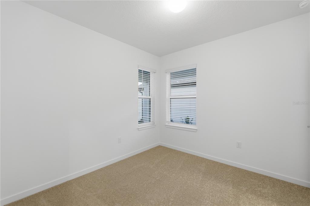 6760 Southwest 90th Loop Ocala, FL 34476 - Photo 22 of 28 an empty room with a window