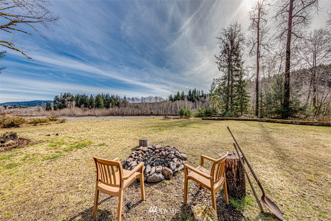 3386 Undi Road Forks, WA 98331 - Photo 11 of 36 a view of a swimming pool with a lounge chair