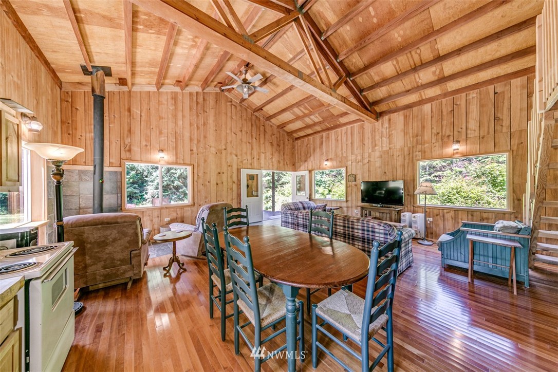3386 Undi Road Forks, WA 98331 - Photo 26 of 36 a view of a dining room with furniture window and wooden floor