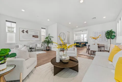 a living room with furniture and a table