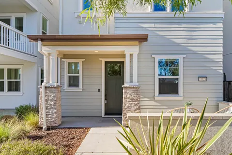 a front view of a house with a garage