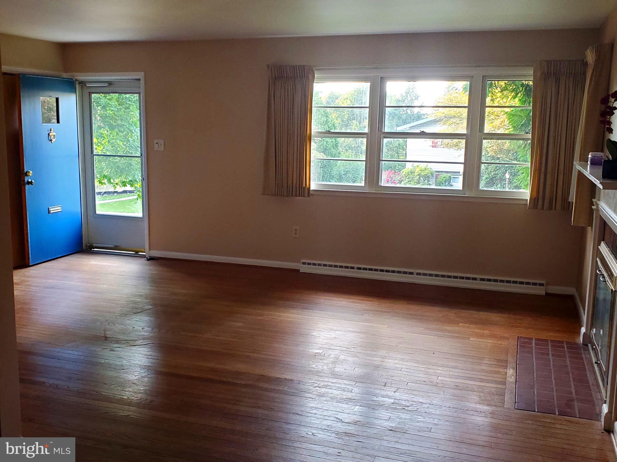 3010 Curtis Road Reading, PA 19608 - Photo 2 of 14 a view of room with window and wooden floor