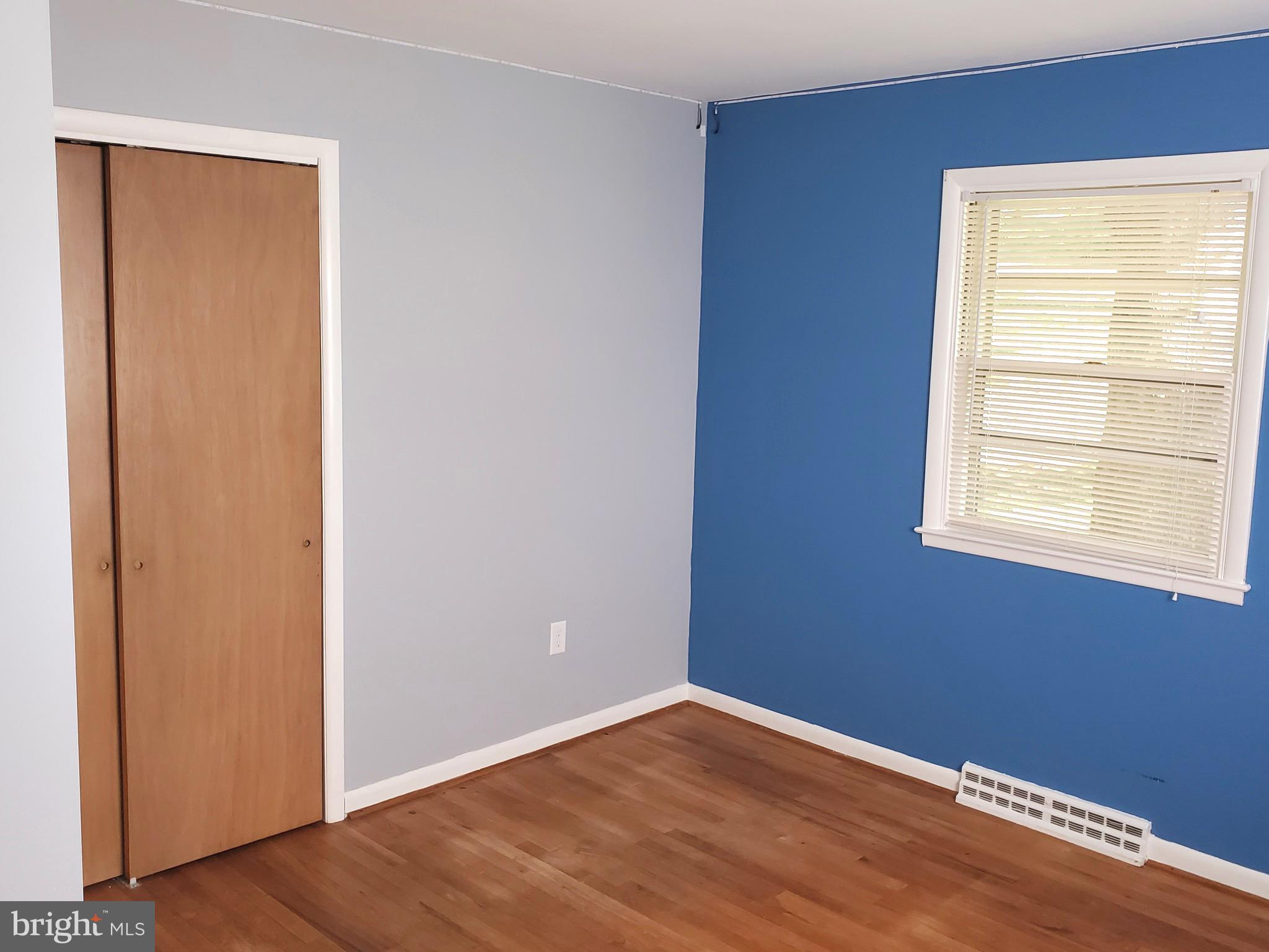 3010 Curtis Road Reading, PA 19608 - Photo 9 of 14 a view of an empty room with wooden floor and a window