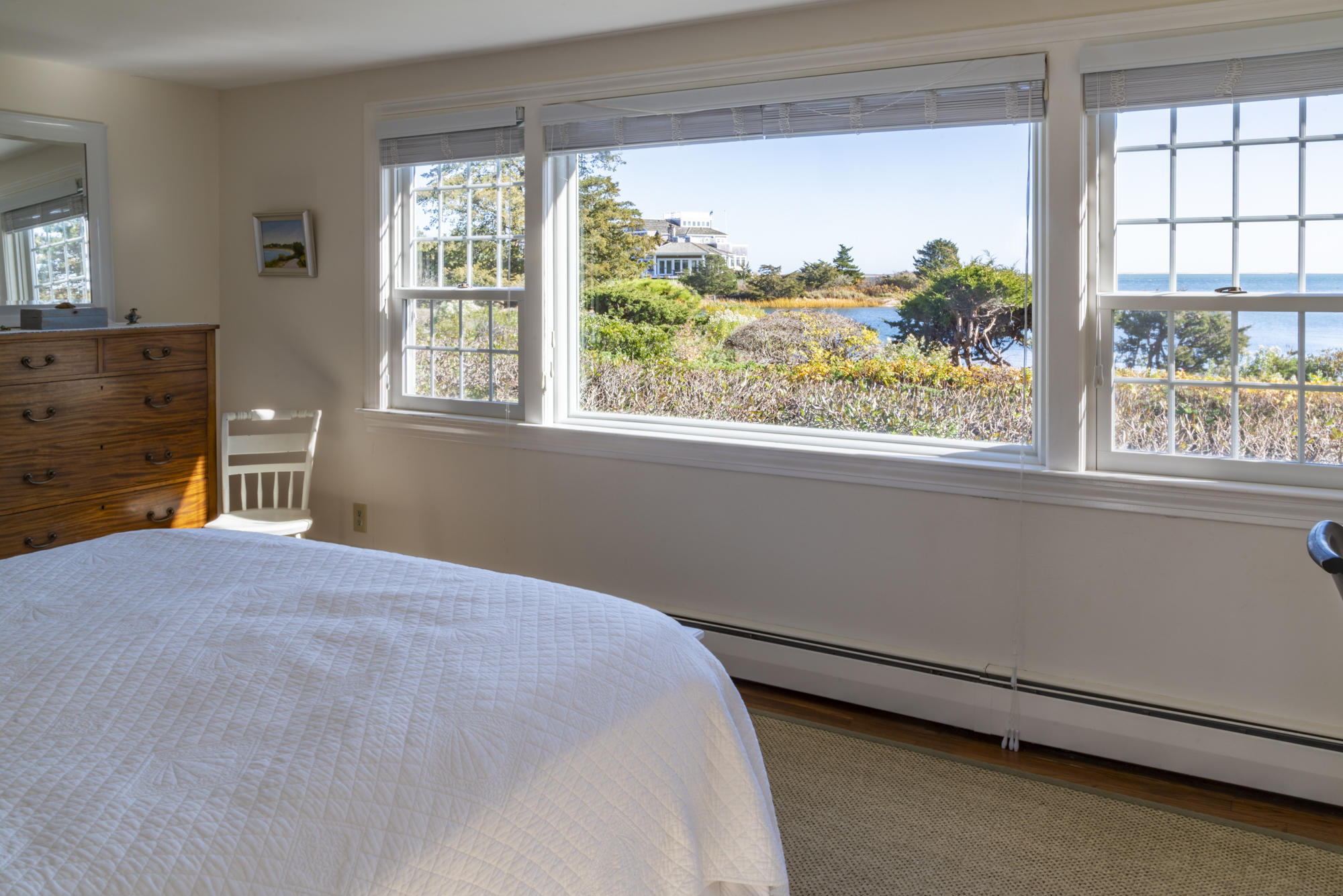132 Old Salt Works Road Chatham, MA 02633 - Photo 17 of 34 a bedroom with a bed and a window