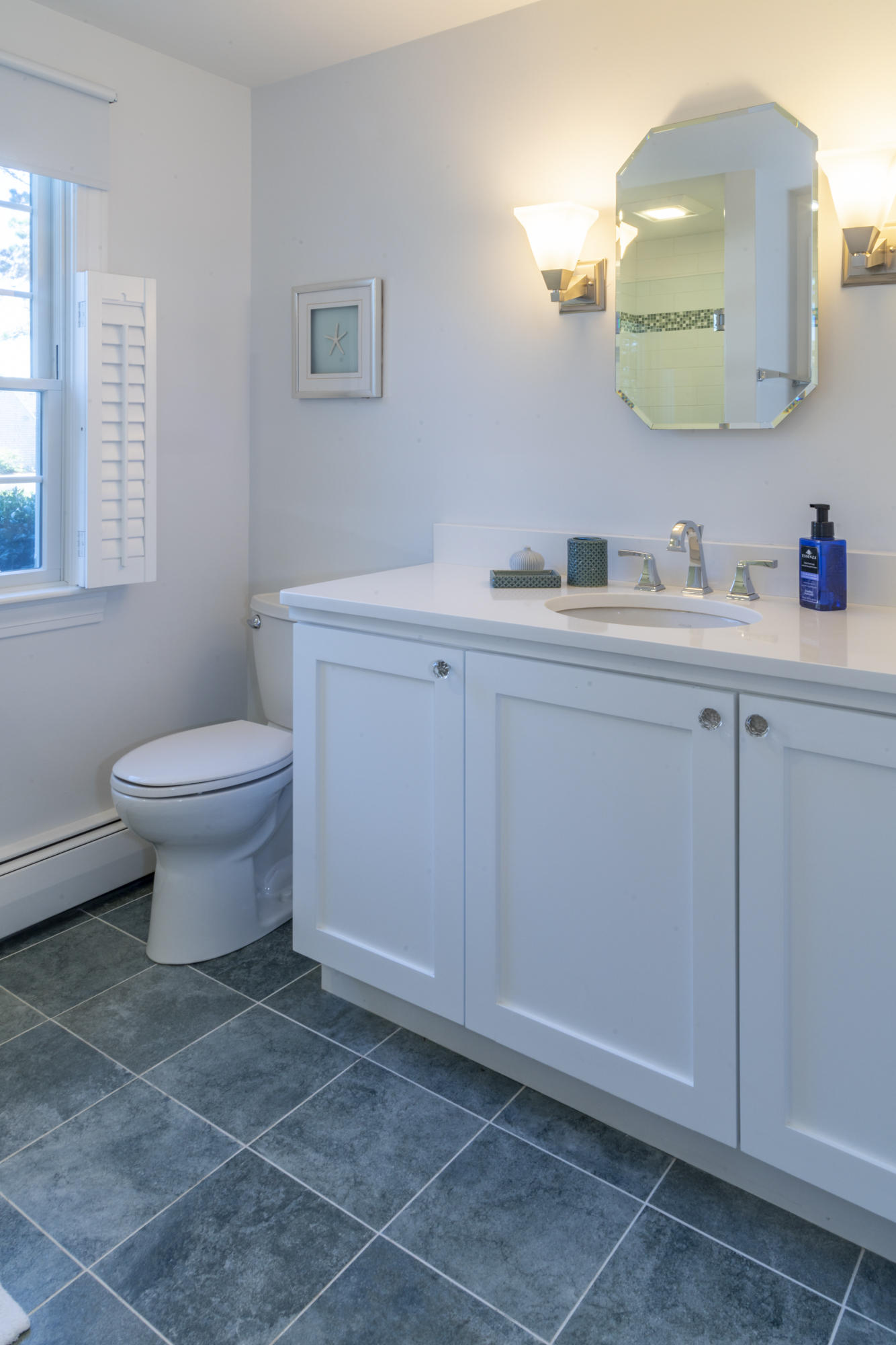 132 Old Salt Works Road Chatham, MA 02633 - Photo 27 of 34 a bathroom with a toilet sink and mirror
