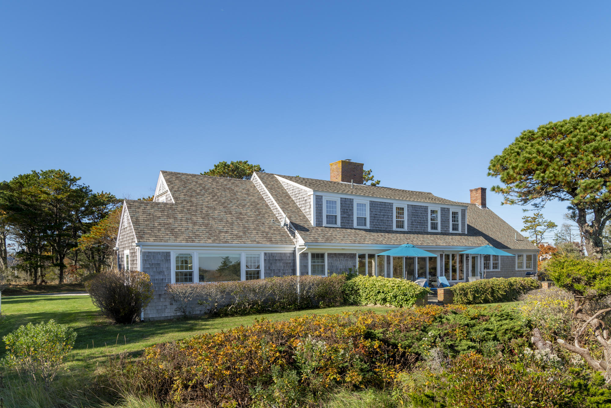 132 Old Salt Works Road Chatham, MA 02633 - Photo 29 of 34 a front view of a house with a garden