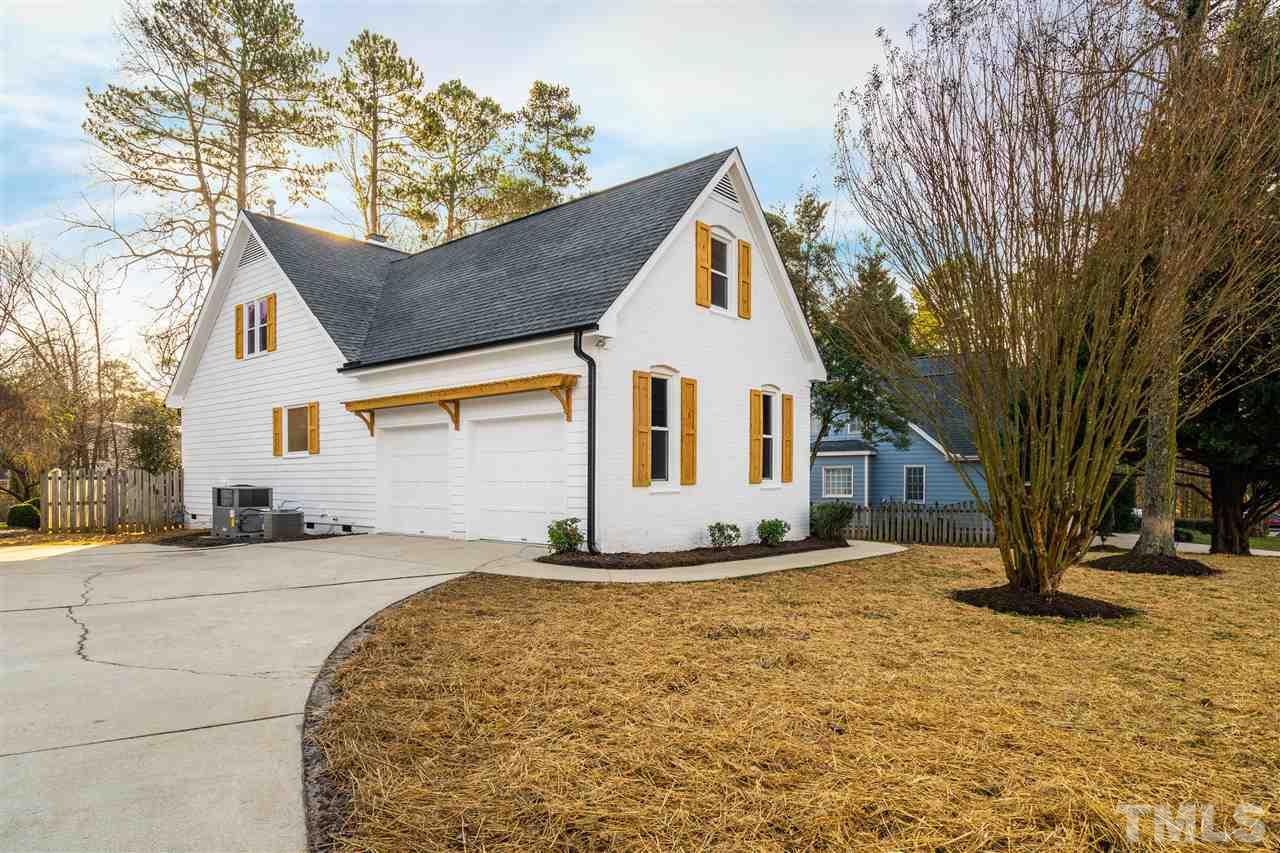 608 Hardimont Road Raleigh, NC 27609 - Photo 3 of 29 a front view of a house with a yard
