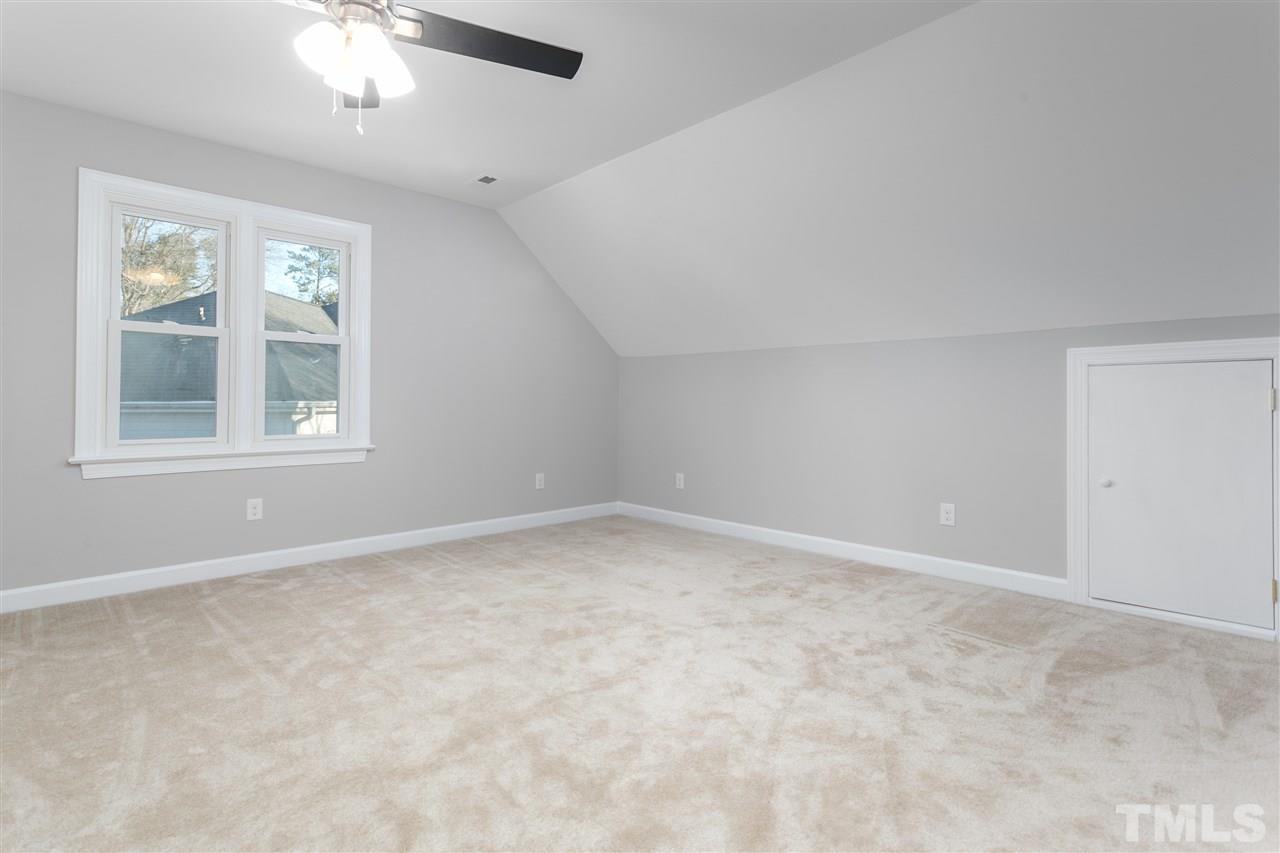 608 Hardimont Road Raleigh, NC 27609 - Photo 23 of 29 an empty room with a window
