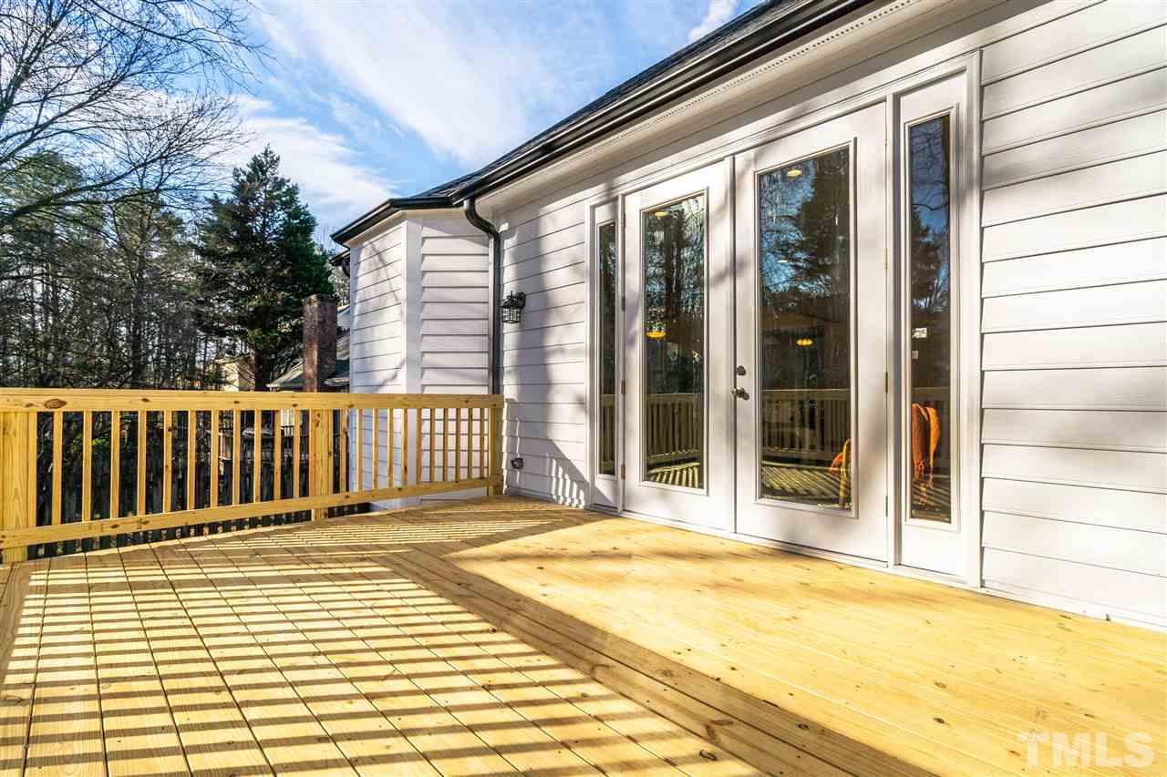 608 Hardimont Road Raleigh, NC 27609 - Photo 25 of 29 a porch with a seating space