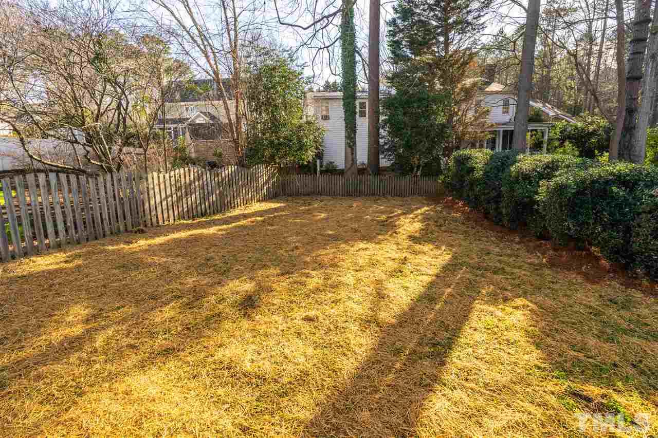 608 Hardimont Road Raleigh, NC 27609 - Photo 27 of 29 a view of a yard with plants and large trees