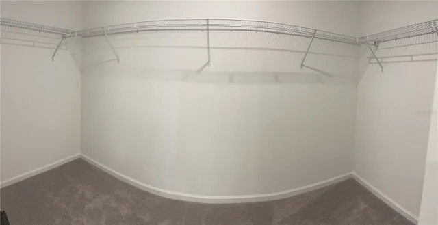 a large house with a large pool