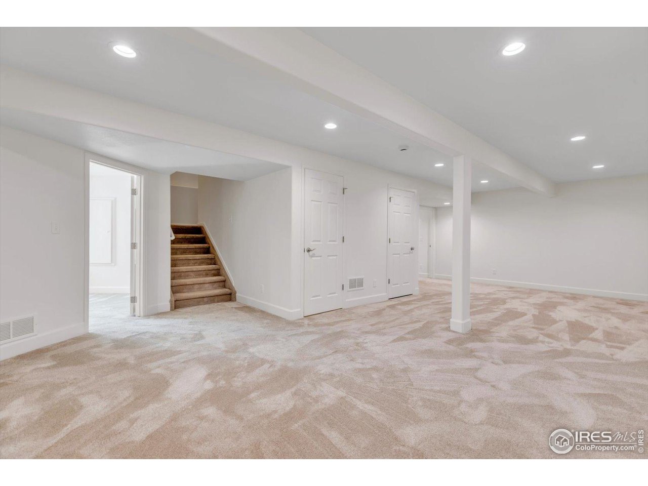 4119 Riley Drive Longmont, CO 80503 - Photo 33 of 47 Newly finished Basement, with large rec area