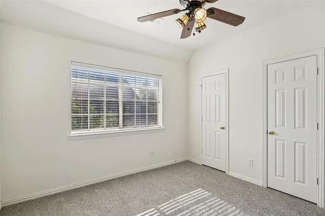 a room with a sink and a window