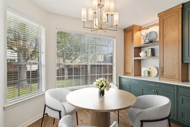 a workspace with furniture and window