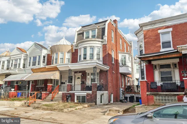 a front view of a building and a street