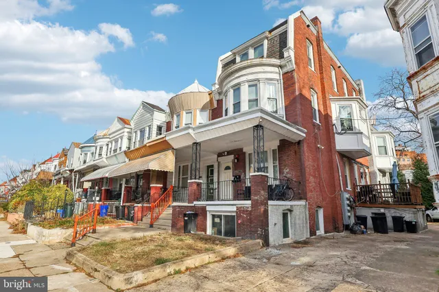 a view of a building with a street