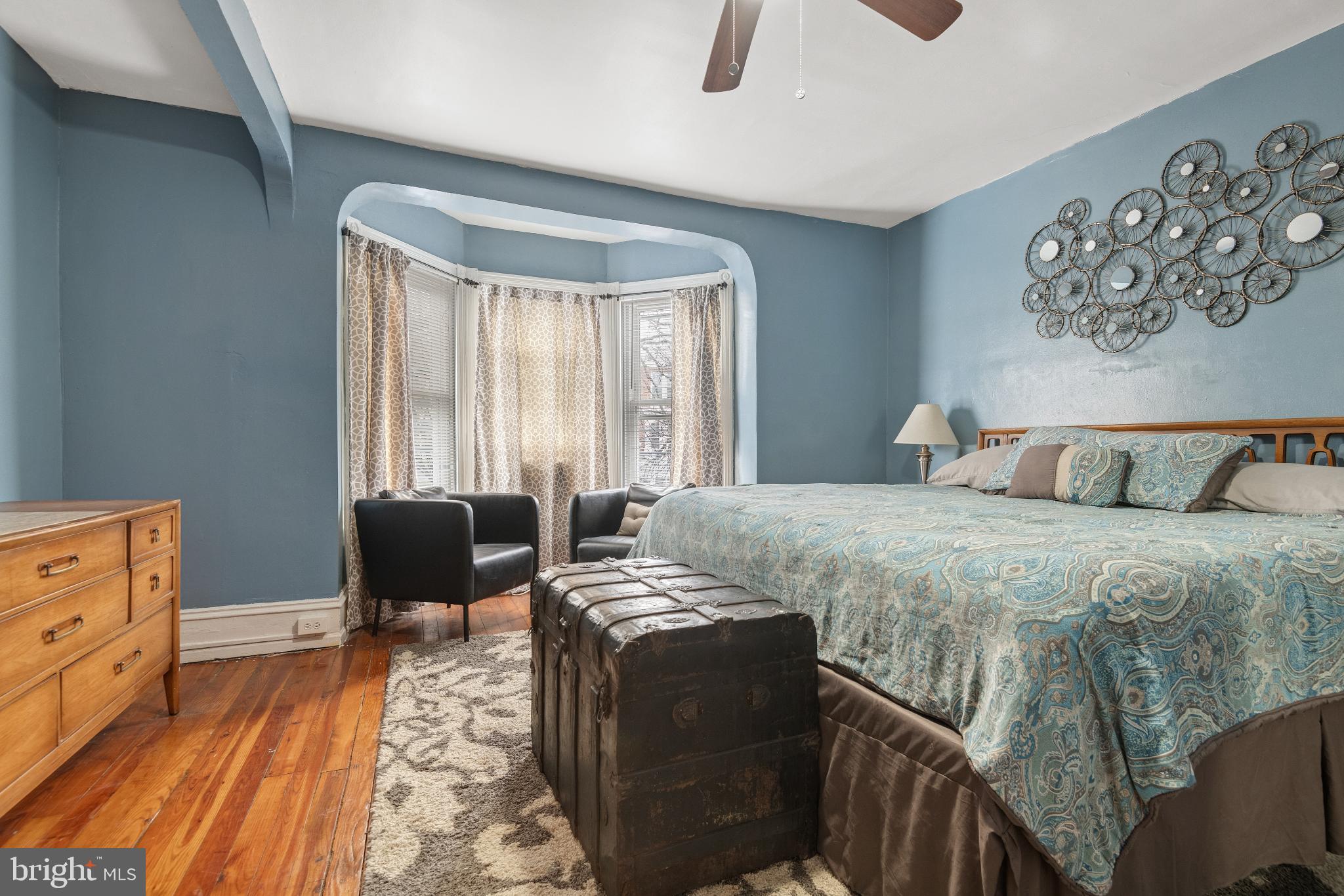 830 North Duke Street Lancaster, PA 17602 - Photo 20 of 41 a bedroom with a bed and wooden floor