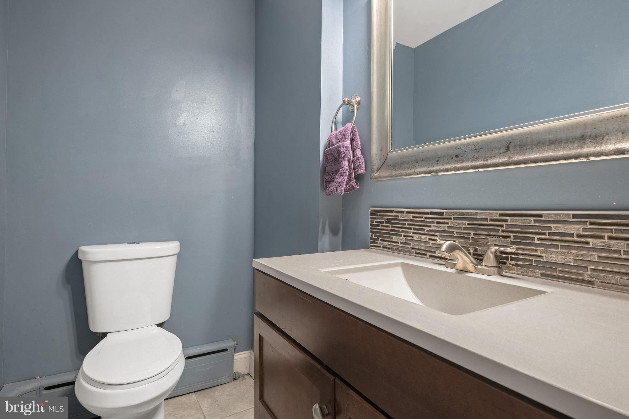 830 North Duke Street Lancaster, PA 17602 - Photo 24 of 41 a bathroom with a toilet sink and mirror