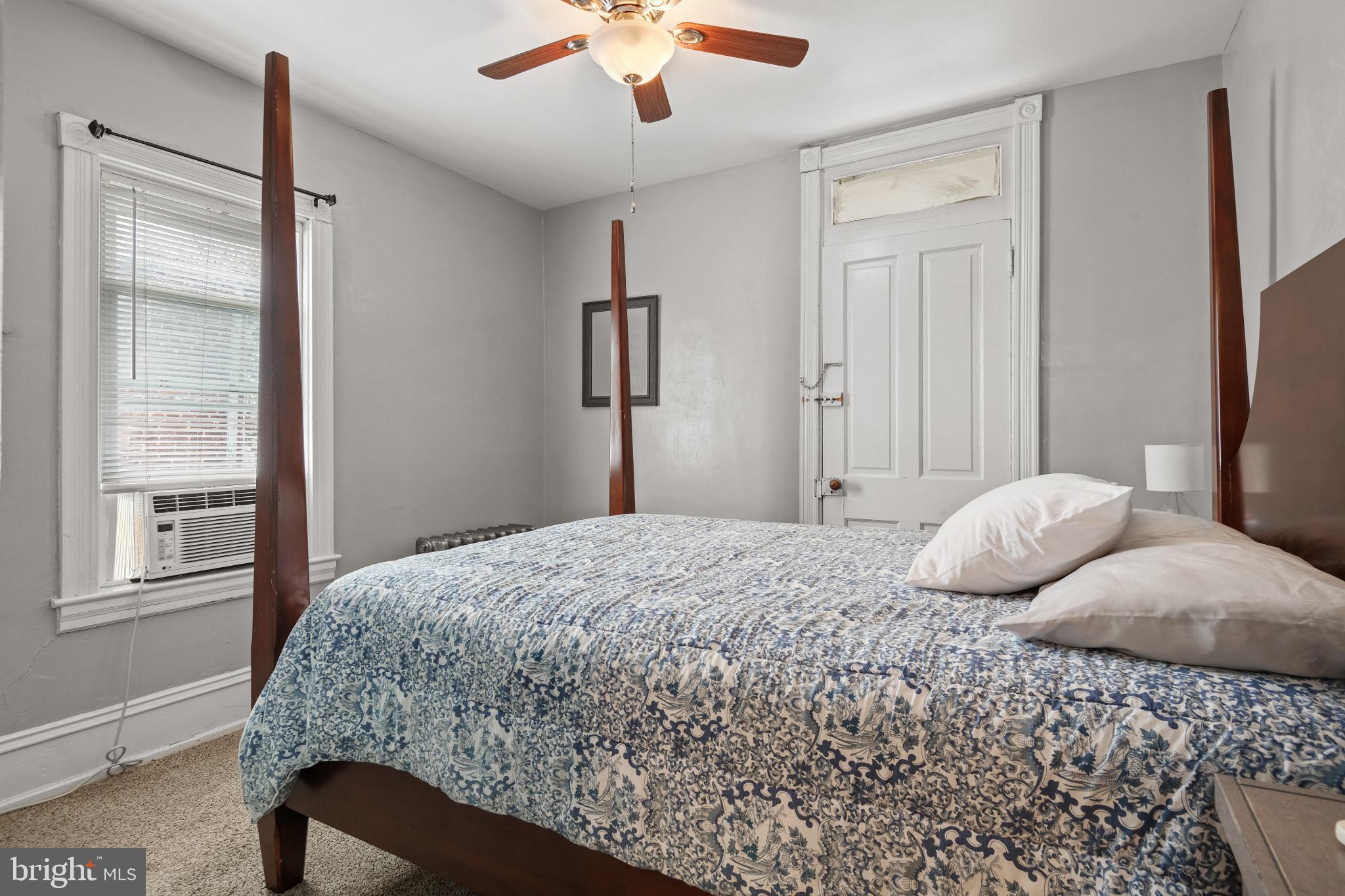 830 North Duke Street Lancaster, PA 17602 - Photo 25 of 41 a bedroom with a large bed and a window