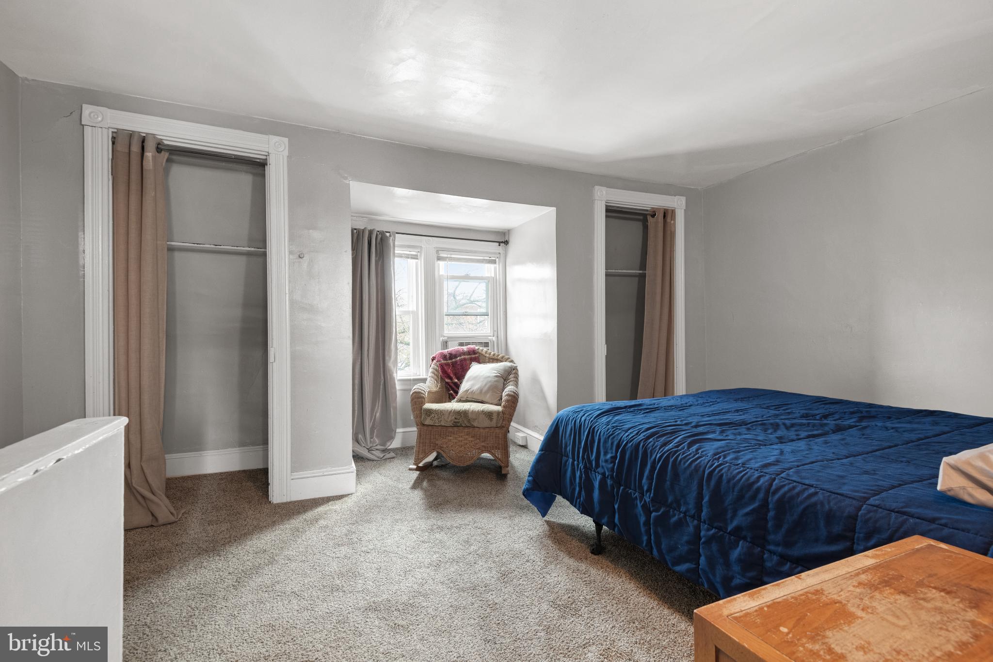 830 North Duke Street Lancaster, PA 17602 - Photo 31 of 41 a bedroom with a bed and a couch