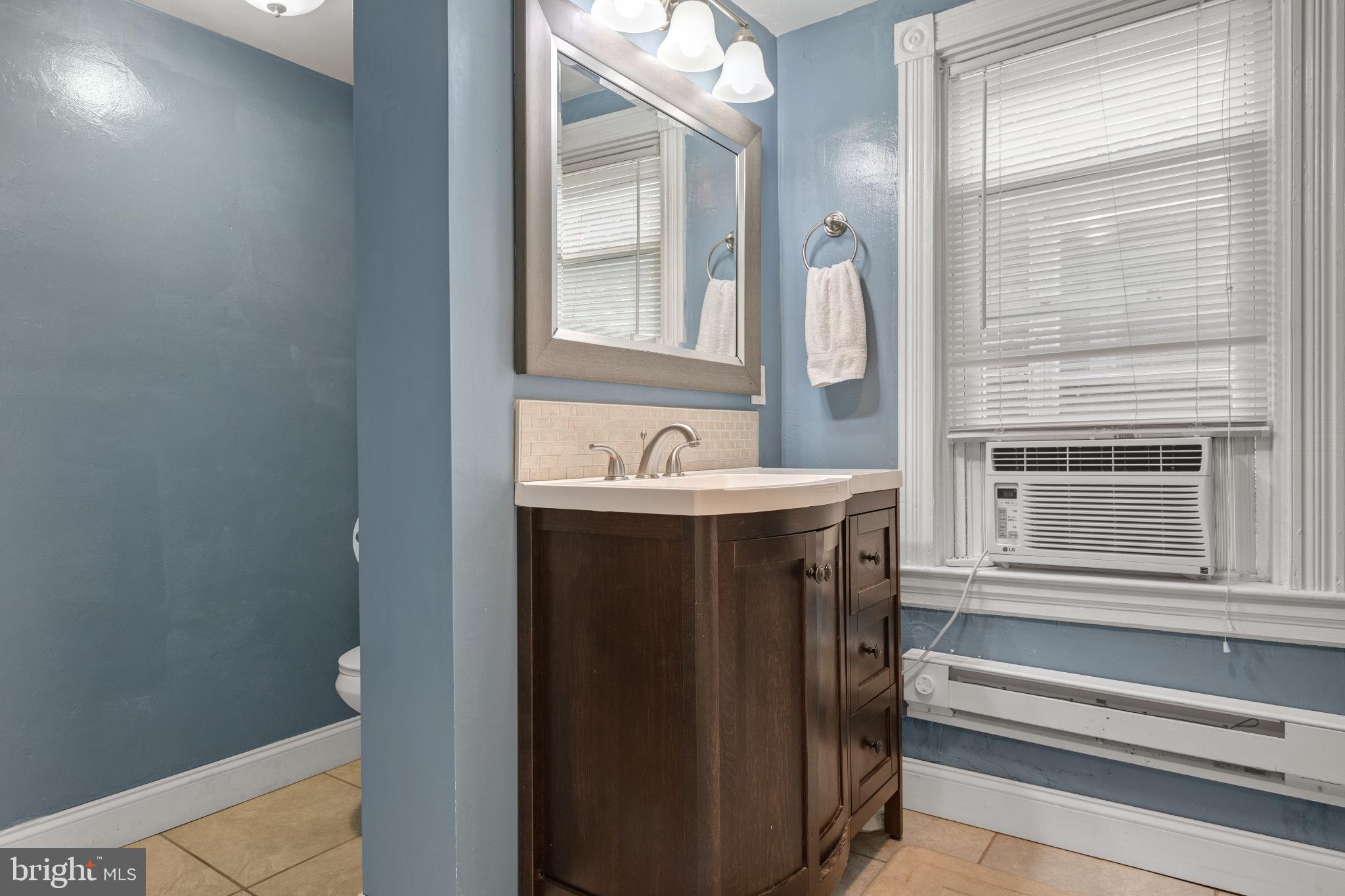 830 North Duke Street Lancaster, PA 17602 - Photo 33 of 41 a bathroom with a sink and a mirror