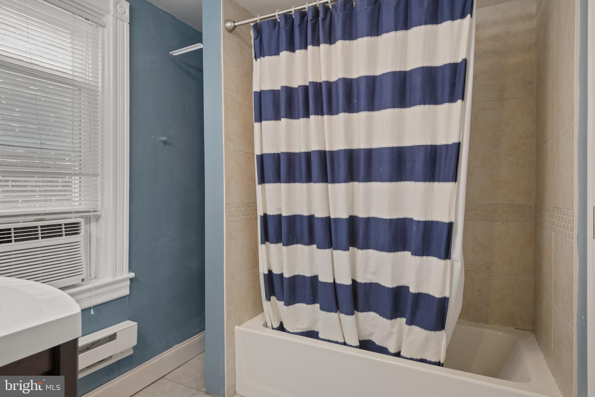 830 North Duke Street Lancaster, PA 17602 - Photo 34 of 41 a bathroom with a black and white checkered floor