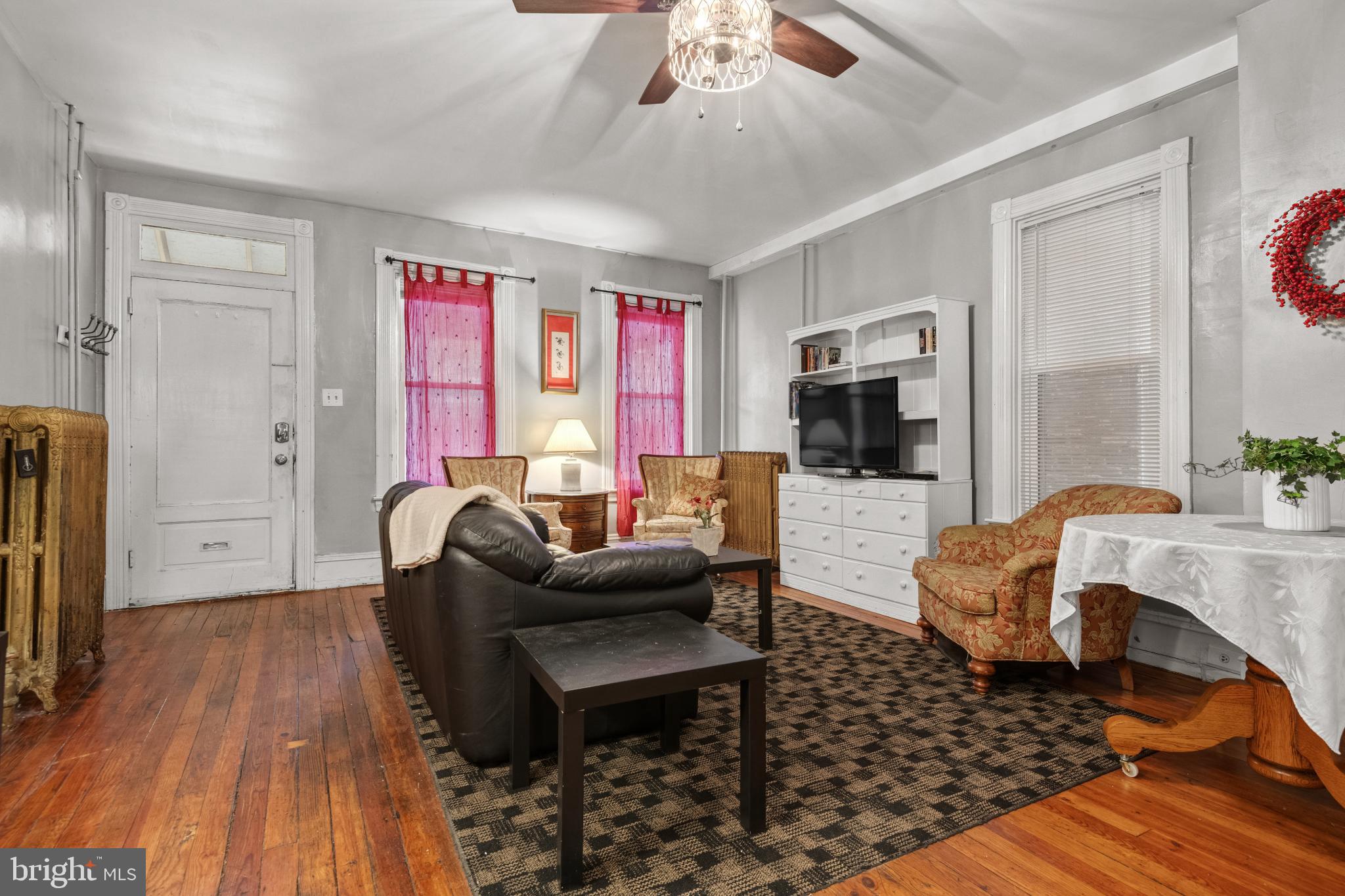 830 North Duke Street Lancaster, PA 17602 - Photo 5 of 41 a living room with furniture and a flat screen tv