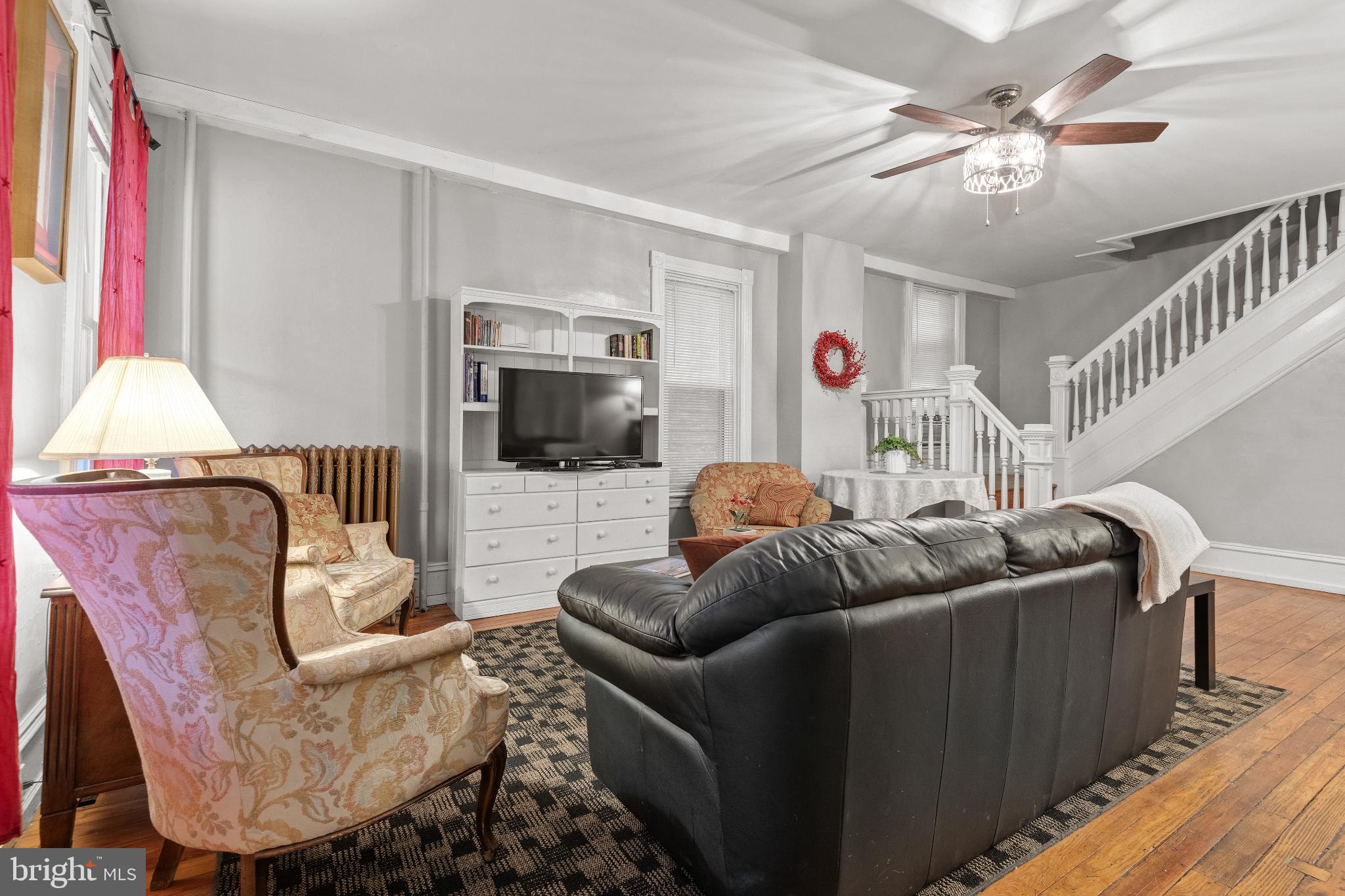 830 North Duke Street Lancaster, PA 17602 - Photo 7 of 41 a living room with furniture and a flat screen tv