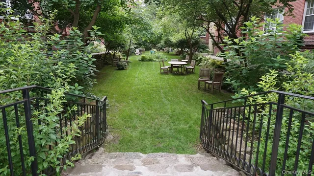 a view of yard from deck of house