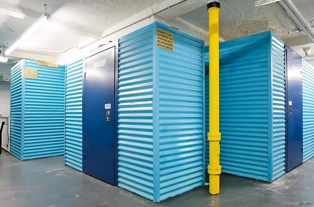 a view of a room with a door and stairs