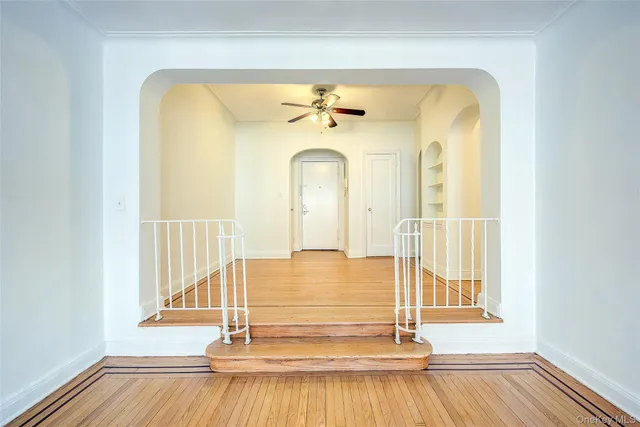 a view of entry way with wooden floor