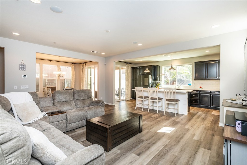 32390 Magee Lane Temecula, CA 92592 - Photo 12 of 75 a living room with furniture and a wooden floor