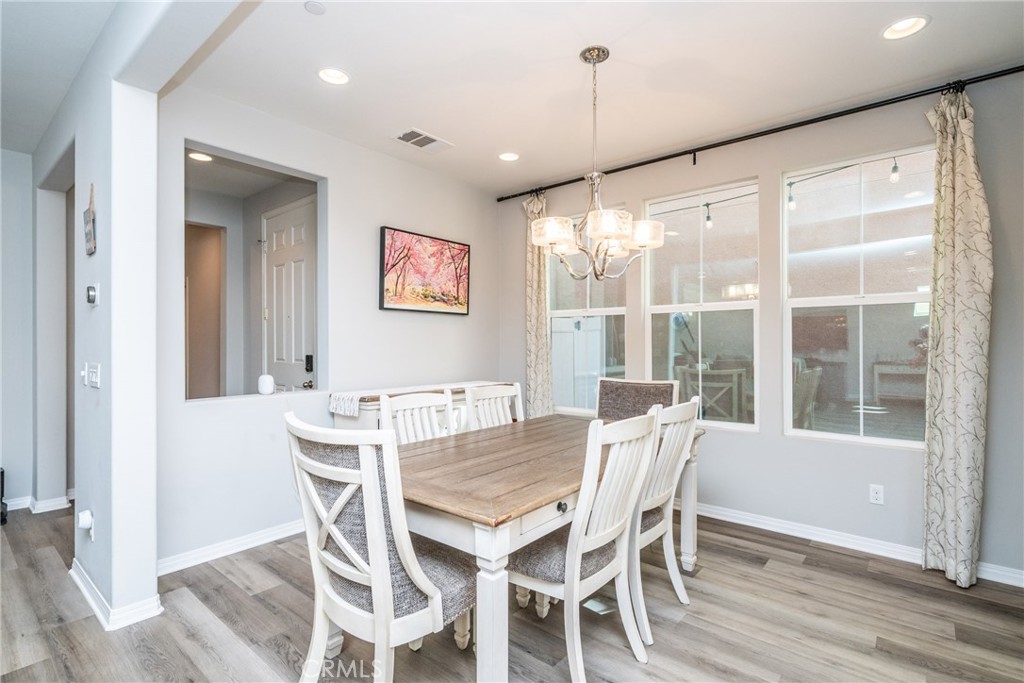 32390 Magee Lane Temecula, CA 92592 - Photo 20 of 75 a view of a dining room with furniture window and outside view