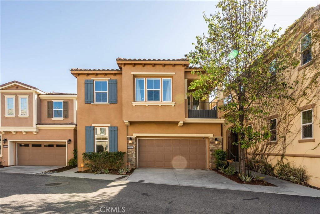 32390 Magee Lane Temecula, CA 92592 - Photo 4 of 75 a front view of a house with a garden