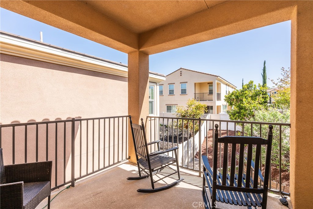 32390 Magee Lane Temecula, CA 92592 - Photo 42 of 75 a view of a chair and tables in the balcony