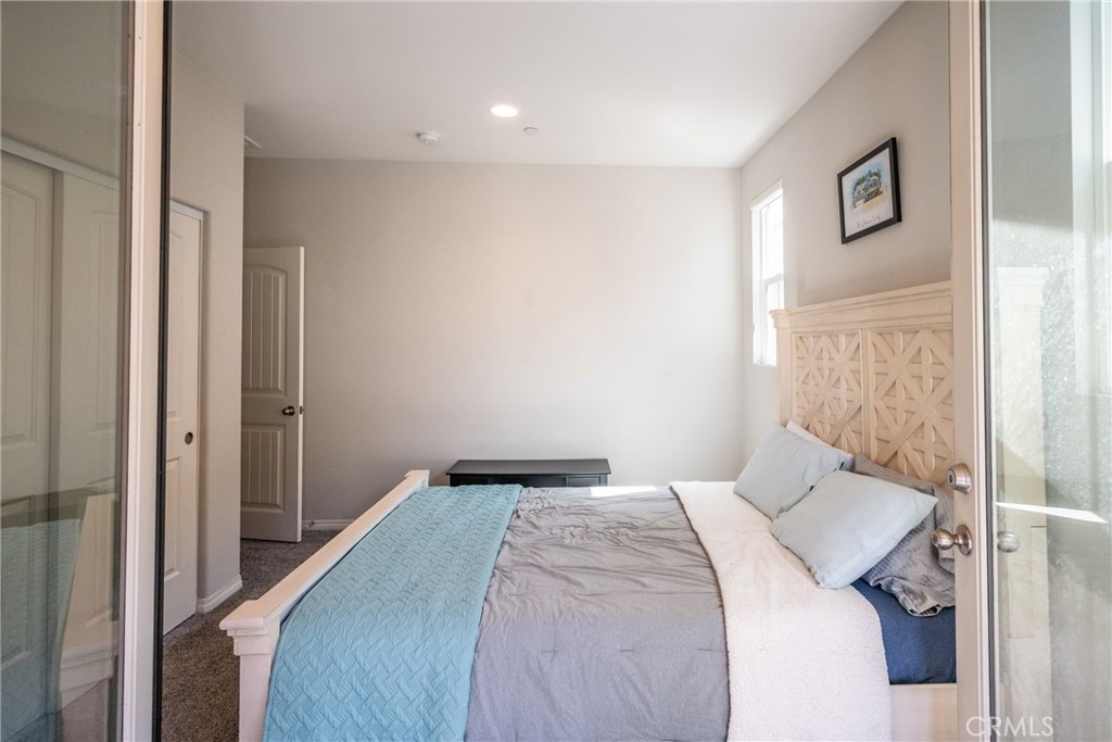 32390 Magee Lane Temecula, CA 92592 - Photo 54 of 75 a bedroom with a bed and a window