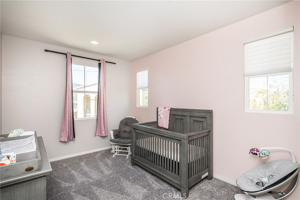 32390 Magee Lane Temecula, CA 92592 - Photo 63 of 75 a bedroom with furniture and a window