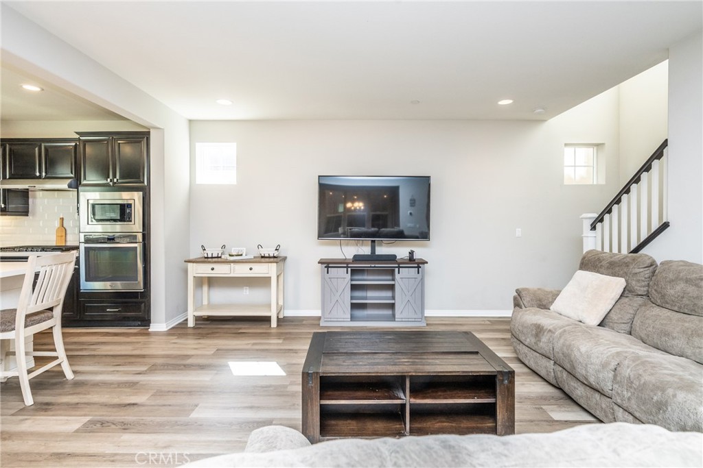 32390 Magee Lane Temecula, CA 92592 - Photo 7 of 75 a living room with furniture and a flat screen tv