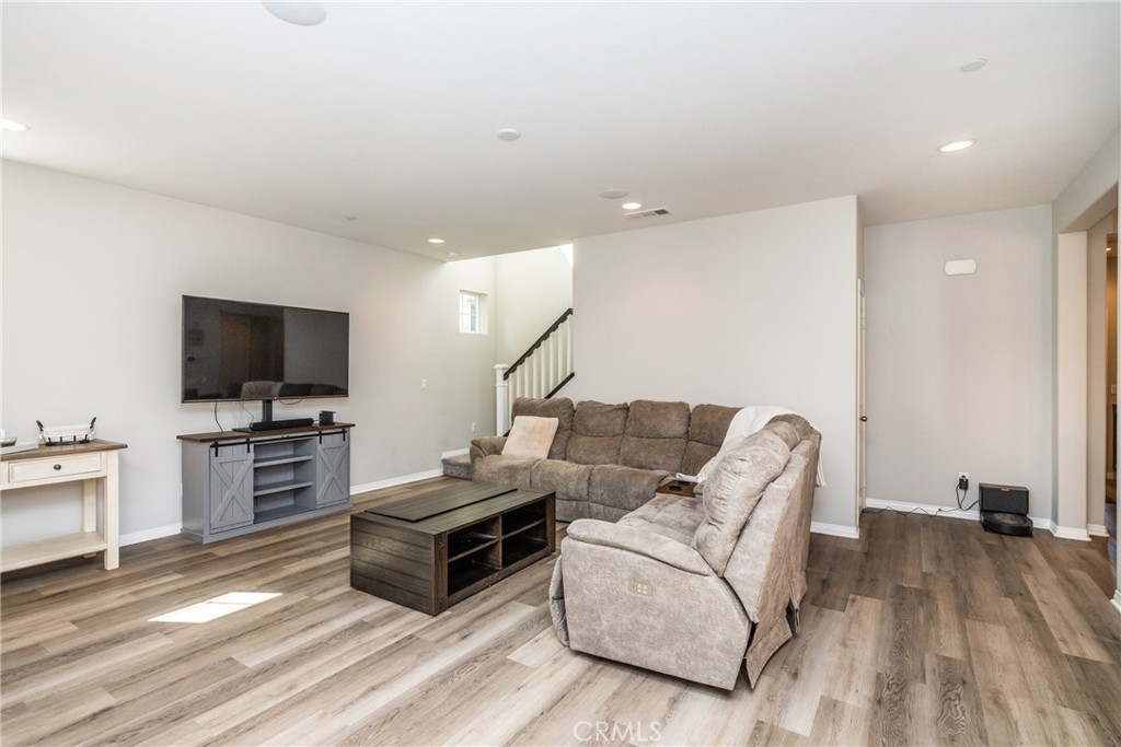 32390 Magee Lane Temecula, CA 92592 - Photo 8 of 75 a living room with furniture and a flat screen tv