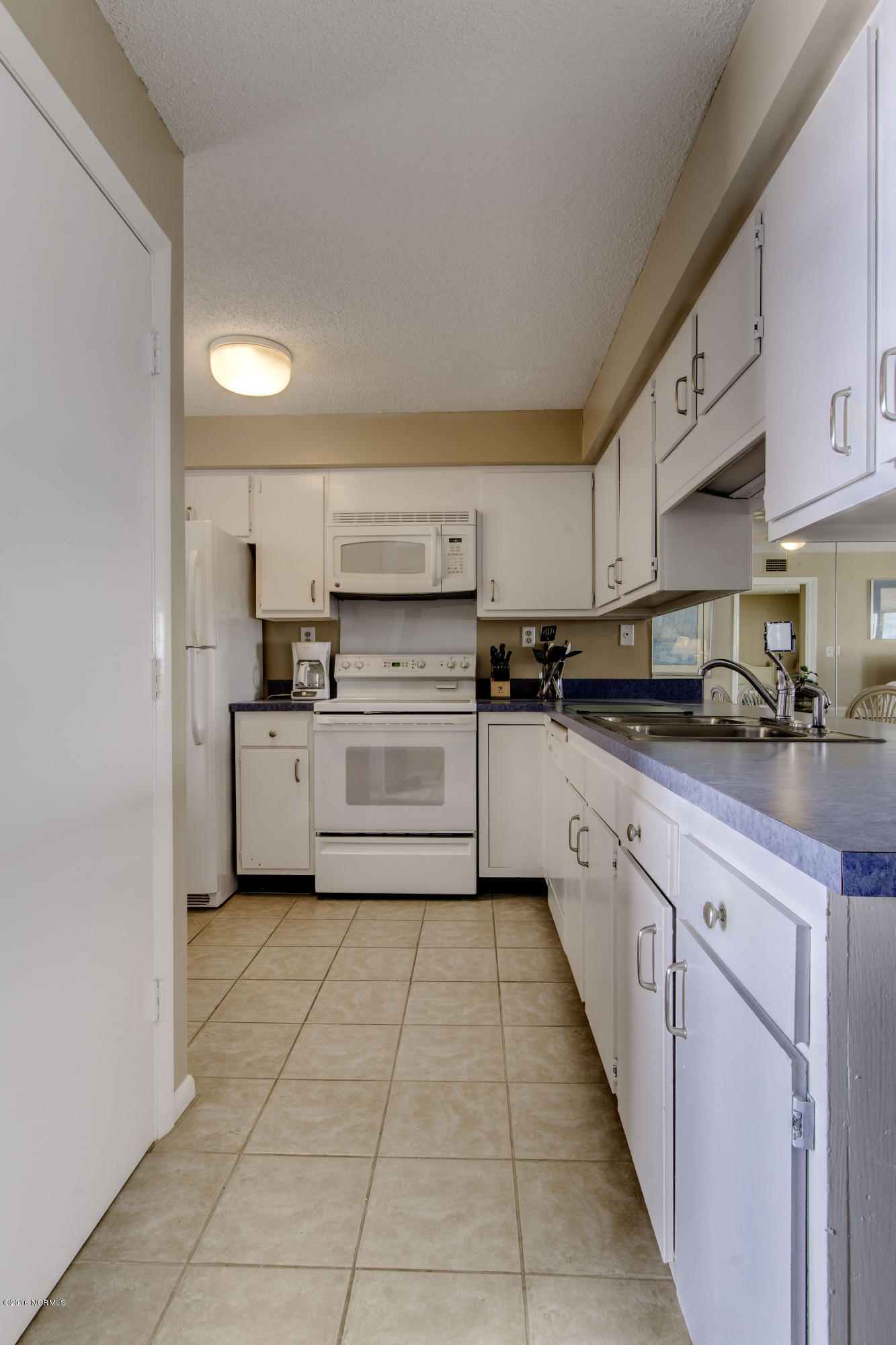1505 Salter Path Road, Unit 533 Indian Beach, NC 28512 - Photo 3 of 10 Kitchen with good size pantry
